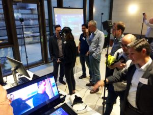 Group of researchers and students try the VR technology.