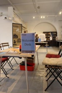 Table w 'Welcome desk' sign